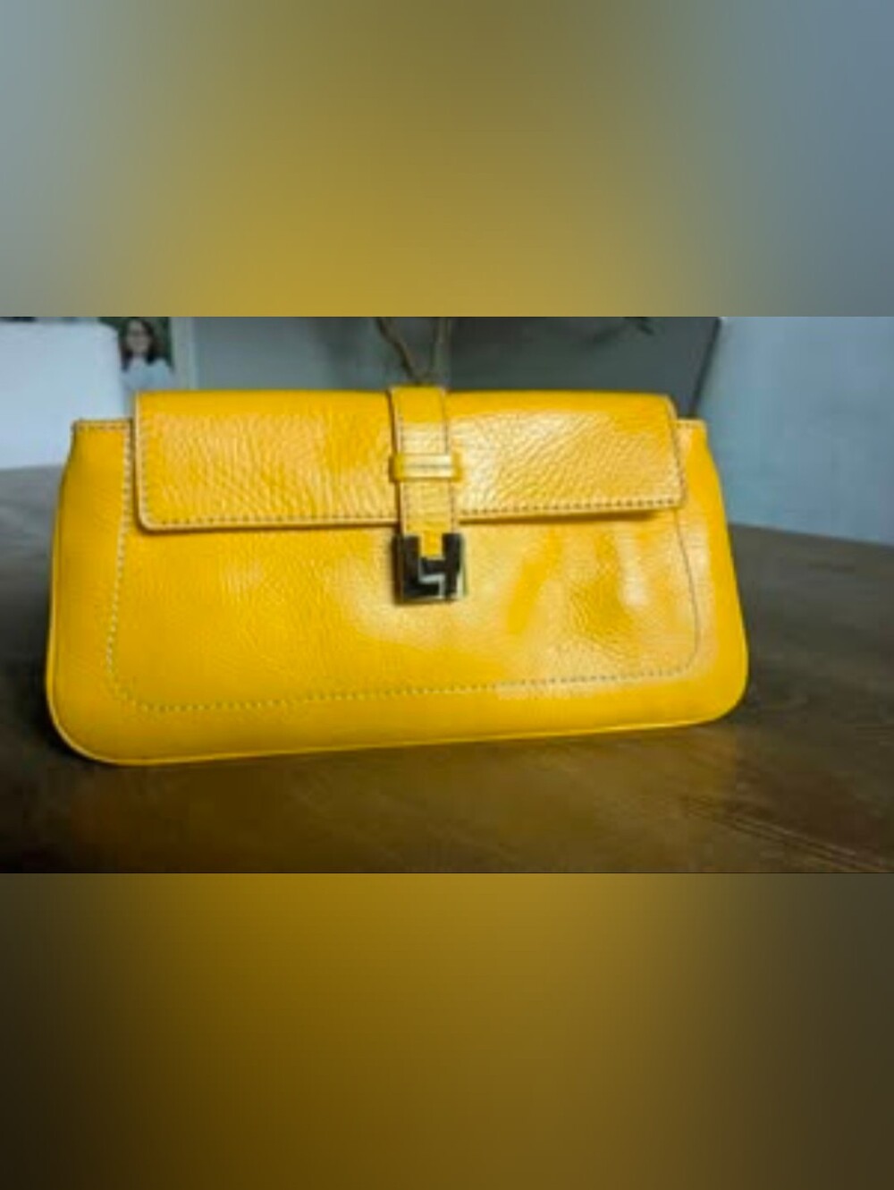 Yellow Lambertson Truex pebbled leather clutch purse with gold hardware